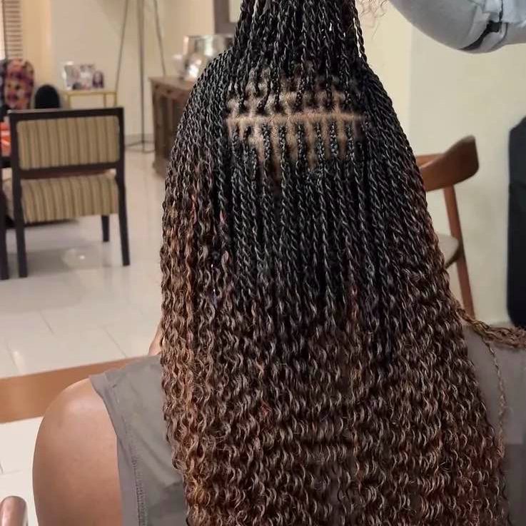 Artificial Sisterlocs in Nairobi, mobile braiding by Braiding Nairobi